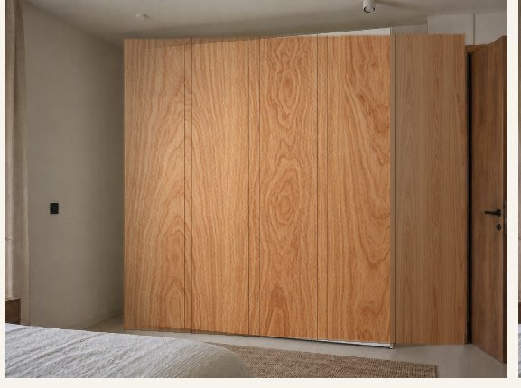 PAX wardrobe after being upgraded with oak veneer fronts